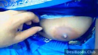 Pressing big tits of desi maid