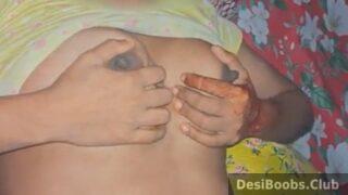 Horny village girl massaging soft desi tits